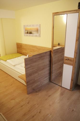 Un ou plusieurs lits dans un hébergement de l'établissement Hotel Highway - Bed & Breakfast