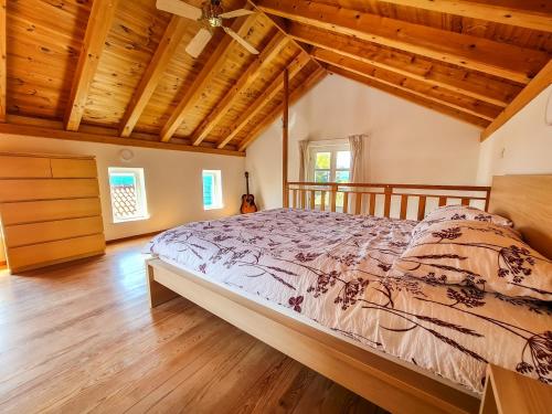 Postel nebo postele na pokoji v ubytování Villa Insula