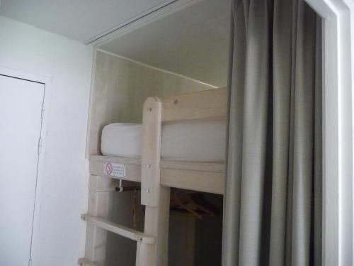 Кровать или кровати в номере Appartement Grand confort Valfréjus 2pièces 6 couchages