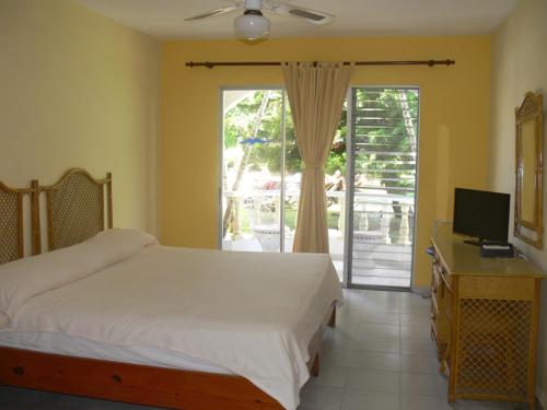 Postel nebo postele na pokoji v ubytování Hotel Voramar