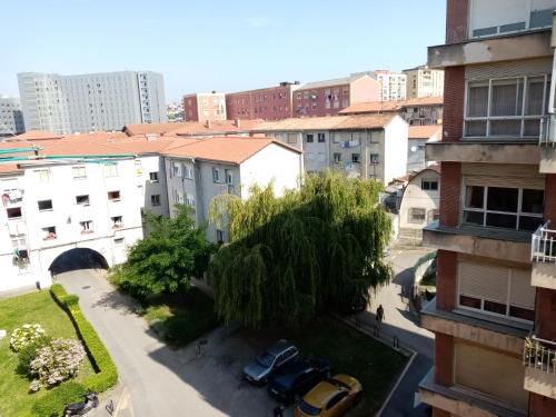 a view of a city from a building at Habitación silenciosa cerca del Hospital valdecilla in Santander