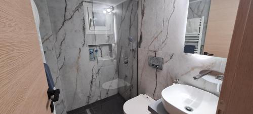 Kylpyhuone majoituspaikassa Flat 66