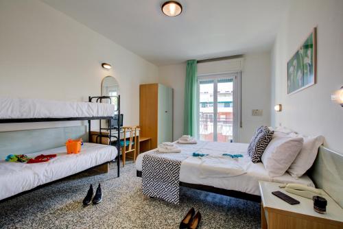 Posteľ alebo postele v izbe v ubytovaní Hotel Christian Ideale Per Famiglie