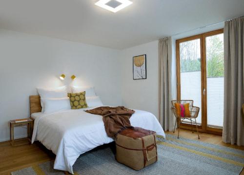 מיטה או מיטות בחדר ב-Kraftquelle Waldhäuser