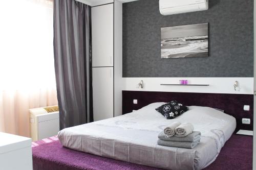 Postel nebo postele na pokoji v ubytování Sunny Day Apartment
