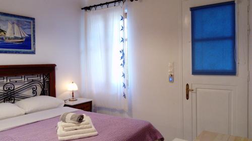 Postel nebo postele na pokoji v ubytování Zacharoula Rooms