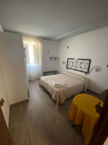 Postel nebo postele na pokoji v ubytování La Casa di Michele
