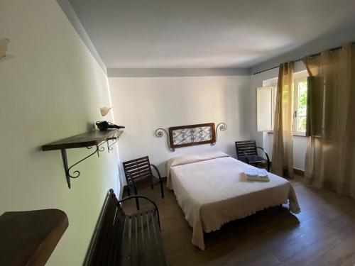 Кровать или кровати в номере La Casa di Michele