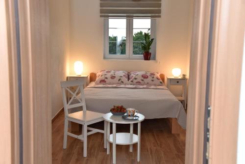 Postel nebo postele na pokoji v ubytování BIO VILLAS