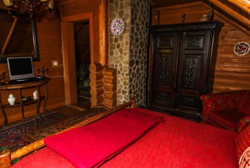 Μια τηλεόραση ή/και κέντρο ψυχαγωγίας στο Hotel Khatky Ruslany