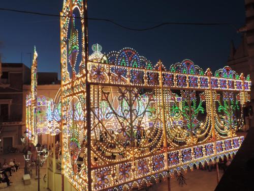 a christmas display of lights on a building at Piazza del Popolo in San Pietro Vernotico
