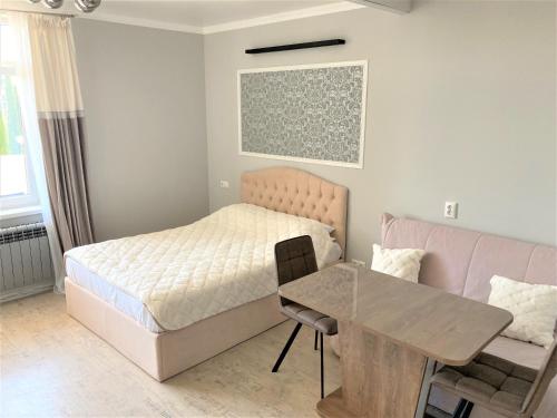 Giường trong phòng chung tại Apartment Siyanie Sochi