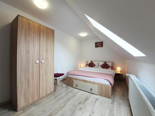 Ένα ή περισσότερα κρεβάτια σε δωμάτιο στο Lavender Apartments