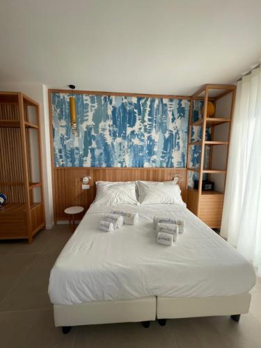 Postel nebo postele na pokoji v ubytování B&B Giro Di Boa