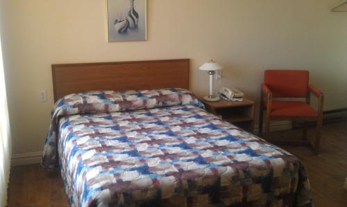 Postel nebo postele na pokoji v ubytování Motel Royal