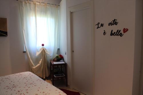 Letto o letti in una camera di Casa le Betulle