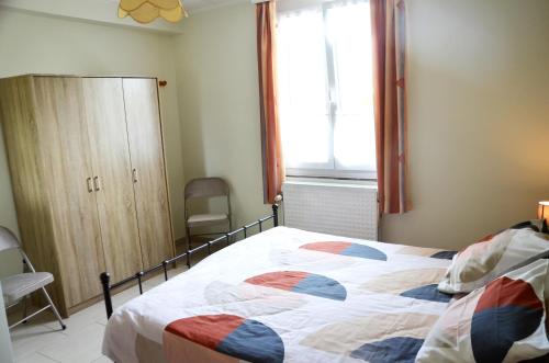 Postel nebo postele na pokoji v ubytování Gite La Brasserie Sivry