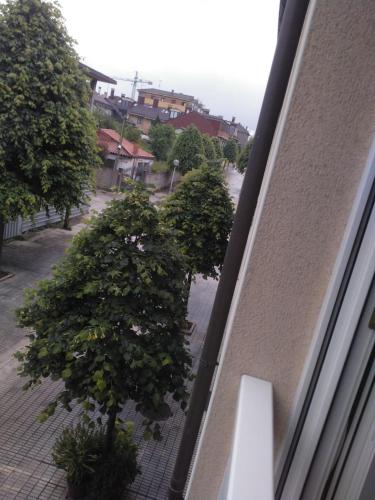 a view of a street from a window at Casa Pimen in Gijón