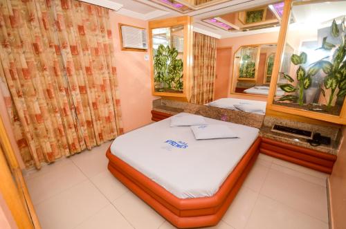 Krevet ili kreveti u jedinici u okviru objekta Hotel Premier (Adult Only)