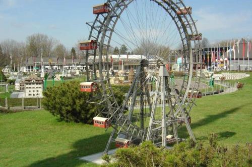 a ferris wheel in a park in a field at Villa Lindwurm in Klagenfurt