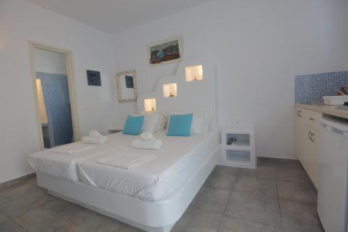 Ένα ή περισσότερα κρεβάτια σε δωμάτιο στο ThalaSEA - village Antiparos