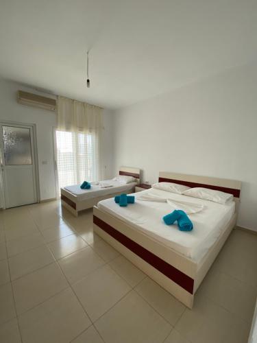 Katil atau katil-katil dalam bilik di Liel Apartments