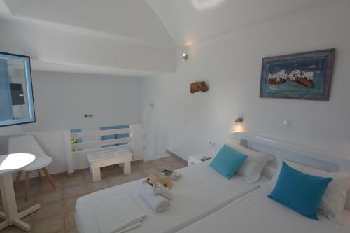 Ένα ή περισσότερα κρεβάτια σε δωμάτιο στο ThalaSEA - village Antiparos