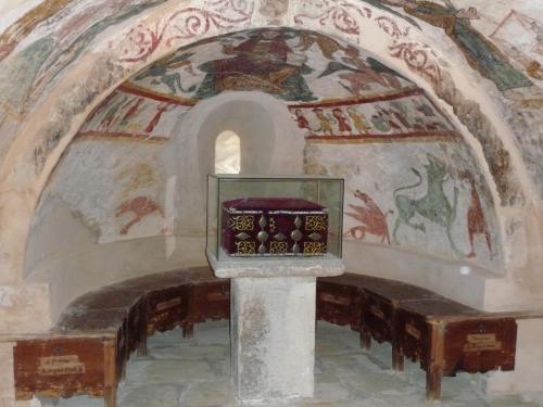 a small altar in a church with paintings on the walls at Hotel Boutique Bodegas De Arnes - Adults Only in Graus