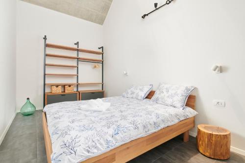 Postel nebo postele na pokoji v ubytování Unique Design Vila Doris