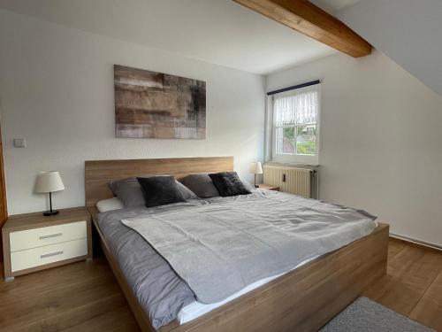 Postel nebo postele na pokoji v ubytování Landhaus Wiesengrund