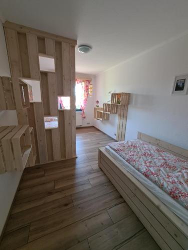 Ένα ή περισσότερα κρεβάτια σε δωμάτιο στο Eure Auszeit