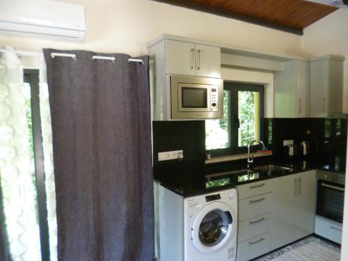 Dapur atau dapur kecil di Casas das Guimbras