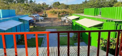 a group of colorful buildings on a balcony at Mandala House Container in Chapada dos Guimarães