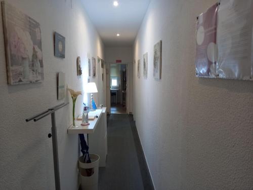 a hallway leading to a hallway with a hallway at Sweet House in Lisbon