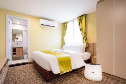 Katil atau katil-katil dalam bilik di Hotel Kuretakeso Thailand Sriracha - SHA Extra Plus