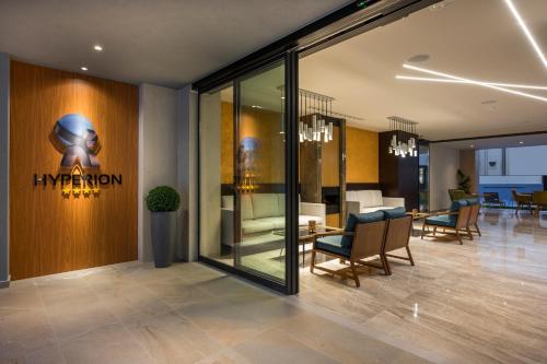 a lobby with a room with a star wars sign at Hyperion City Hotel & Spa in Chania Town