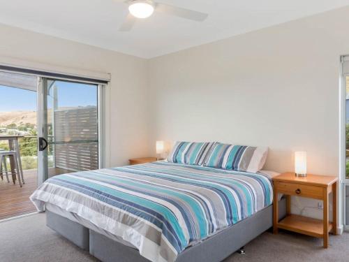 Cama ou camas em um quarto em Carrickalinga Shores 35 Solitude Drive