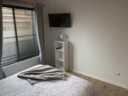 Postel nebo postele na pokoji v ubytování 9 19 Troon Drive