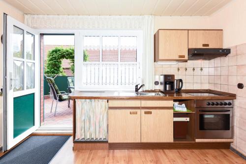 Kuchyň nebo kuchyňský kout v ubytování Ferienwohnung Deichtor im Haus am Deichtor