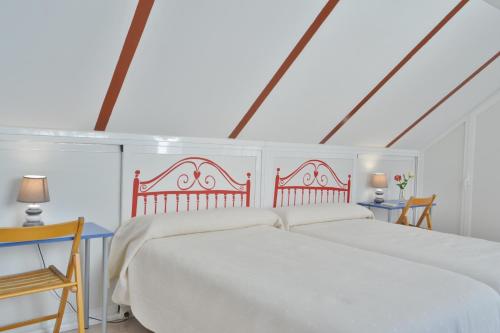 Llit o llits en una habitació de SunShine Villa