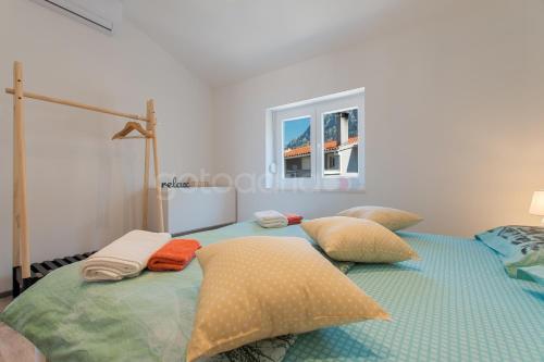 Postel nebo postele na pokoji v ubytování Seaview Penthouse Milano