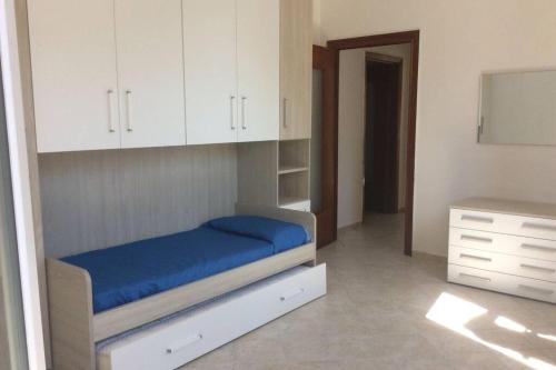 En eller flere senge i et værelse på Ca' Rosetta Your home near Cinque Terre & Versilia