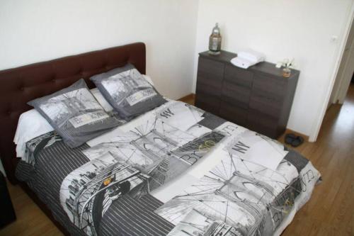 Postel nebo postele na pokoji v ubytování T4 appartement 3 chambres