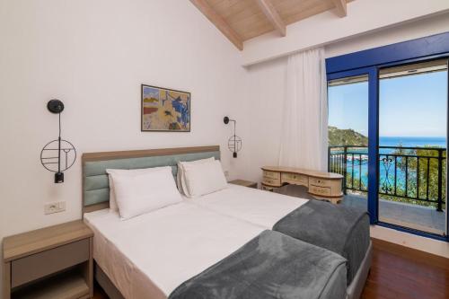 מיטה או מיטות בחדר ב-Armiriki Holiday Home