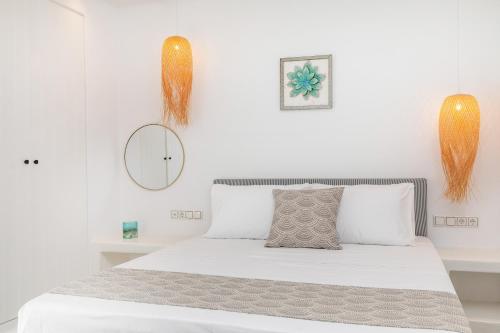 מיטה או מיטות בחדר ב-Naxos DownTown Apartments & Suites
