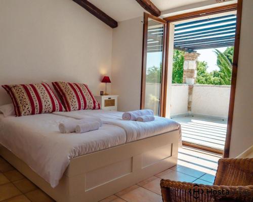 Posteľ alebo postele v izbe v ubytovaní Villa Cypress by Istrian Country Houses