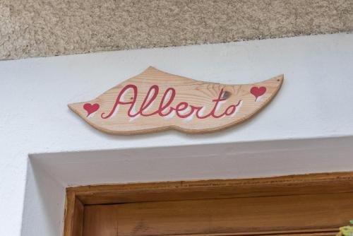 a sign above a door with the word alibaba at Casa Sicina Alberto in Valfloriana