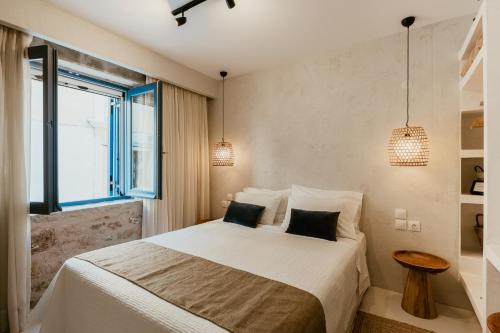 Katil atau katil-katil dalam bilik di BOĒM Boutique Hotel Lefkada