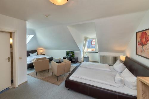 En eller flere senge i et værelse på Park-Hotel Traben-Trarbach