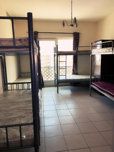 BEDSPACE or DORMITORY ONLY for male and female opp Mashreq Metro, Alantos, United Arab Emirates